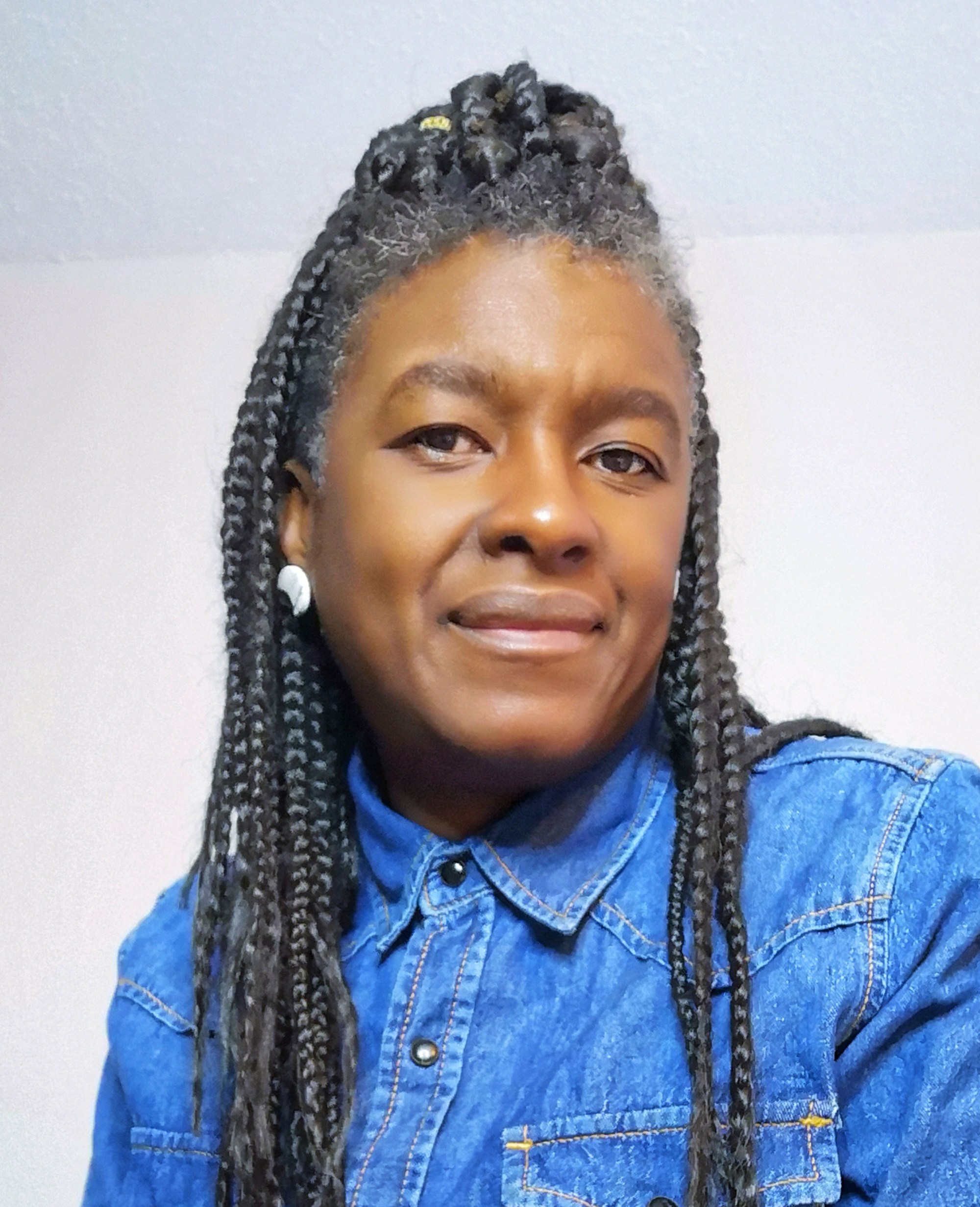 Headshot of Jo-Anne , a black woman smiling